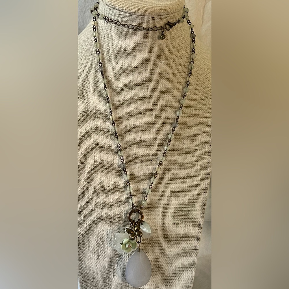 Sweet necklace with flower, butterfly and faceted teardrop bead
